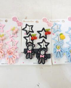 Broches de estrellas y osito